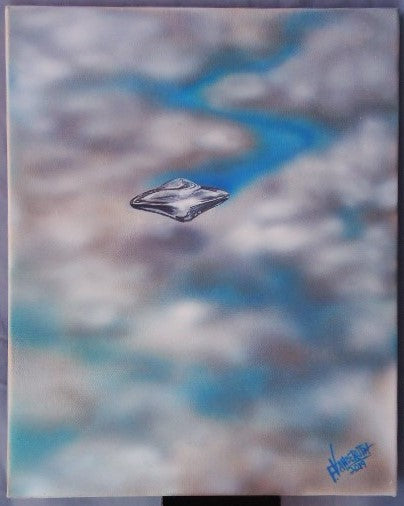 flying saucer floating thru the clouds